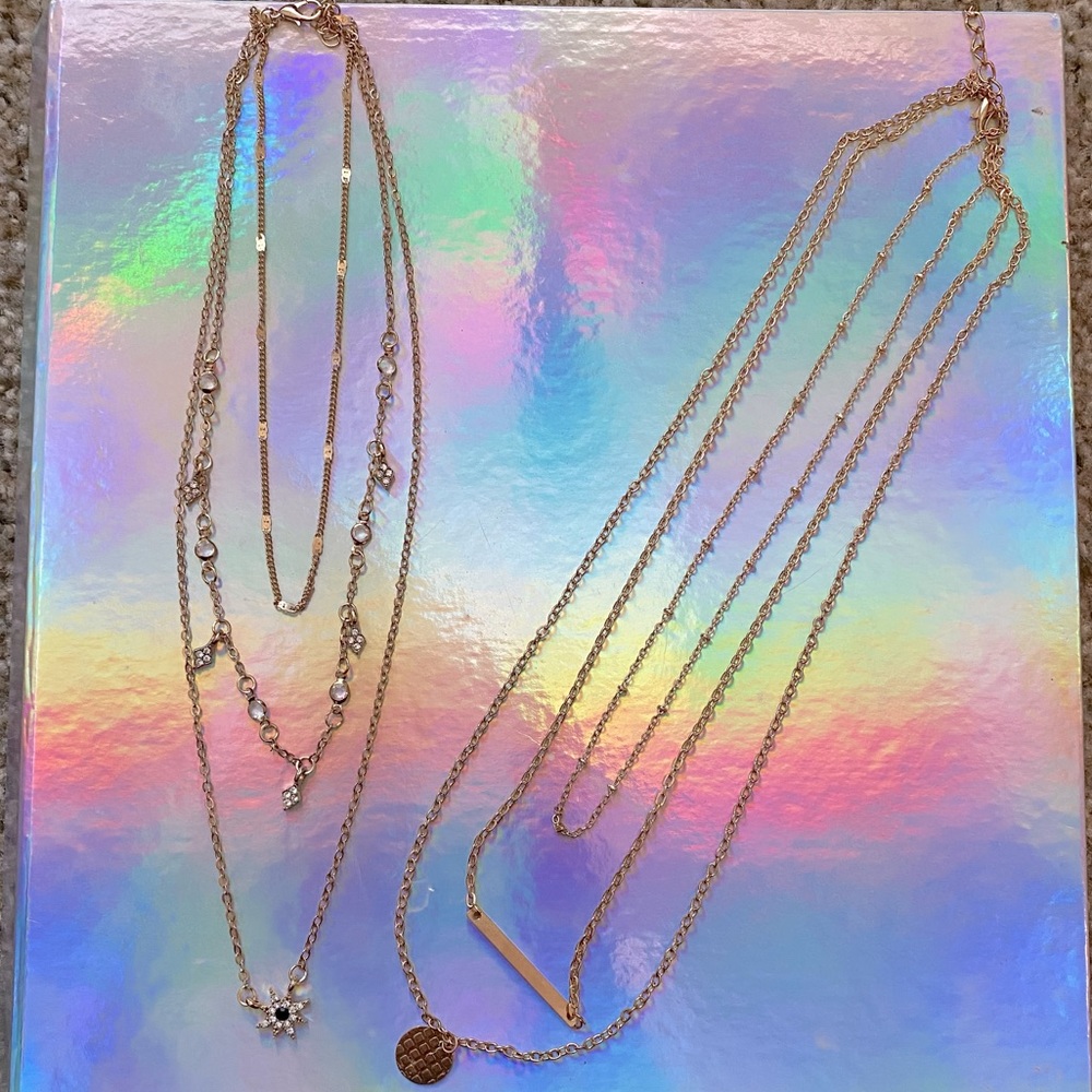 two triple layer necklaces
